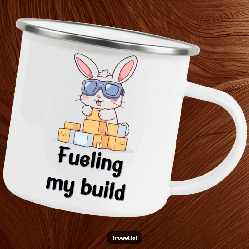 Funny camping mug showcasing a bunny in goggles, focused on stacking small blocks, ready for outdoor adventures and construction humor.